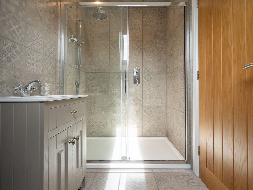 A bathroom with a shower and sink at Valley View Lodge 1 Preston