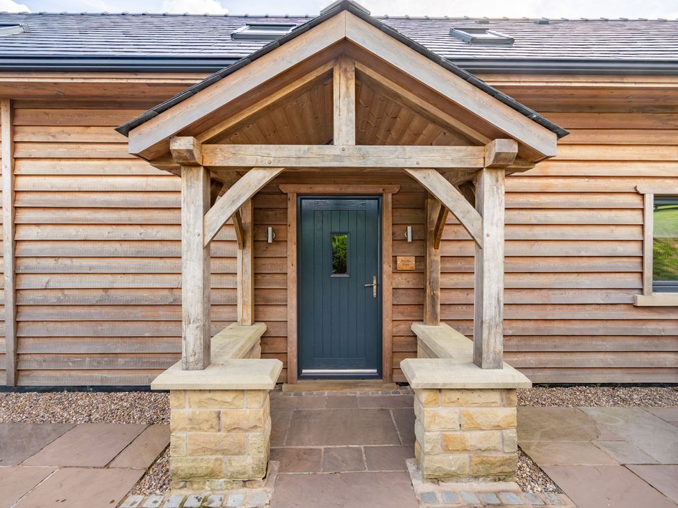 An entrance with a porch and front door at Pendle View in Preston