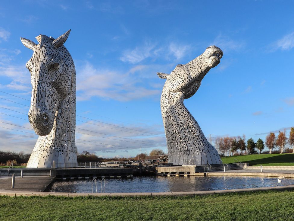 Two large horse sculptures near water at Beechtree Lodge 56 Denny