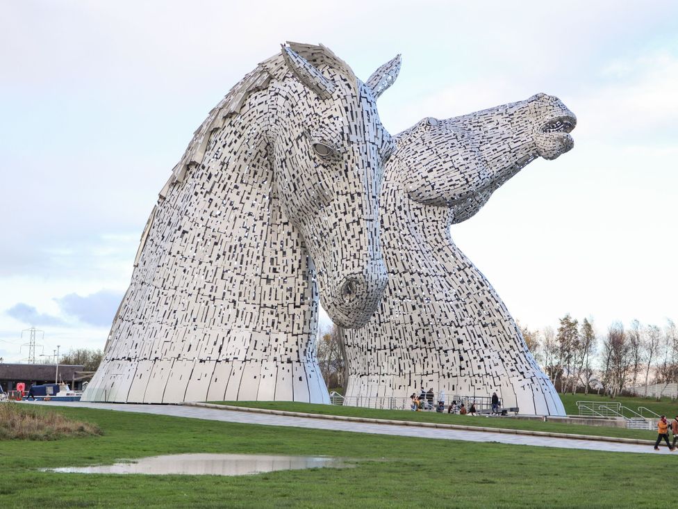 A sculpture of two horse heads at The Kelpies in Falkirk