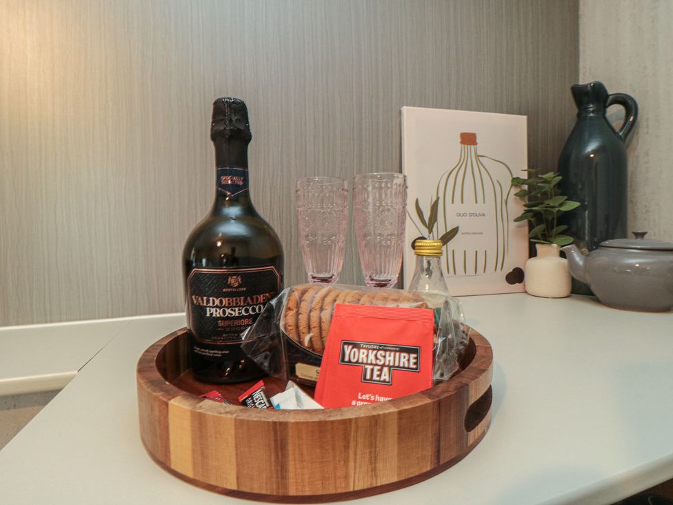 A kitchen with drinks and snacks on a tray at Isla’s Sea Forge in Skinningrove