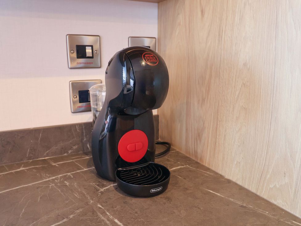 A coffee machine on a countertop at Paws By The Sea Norwich