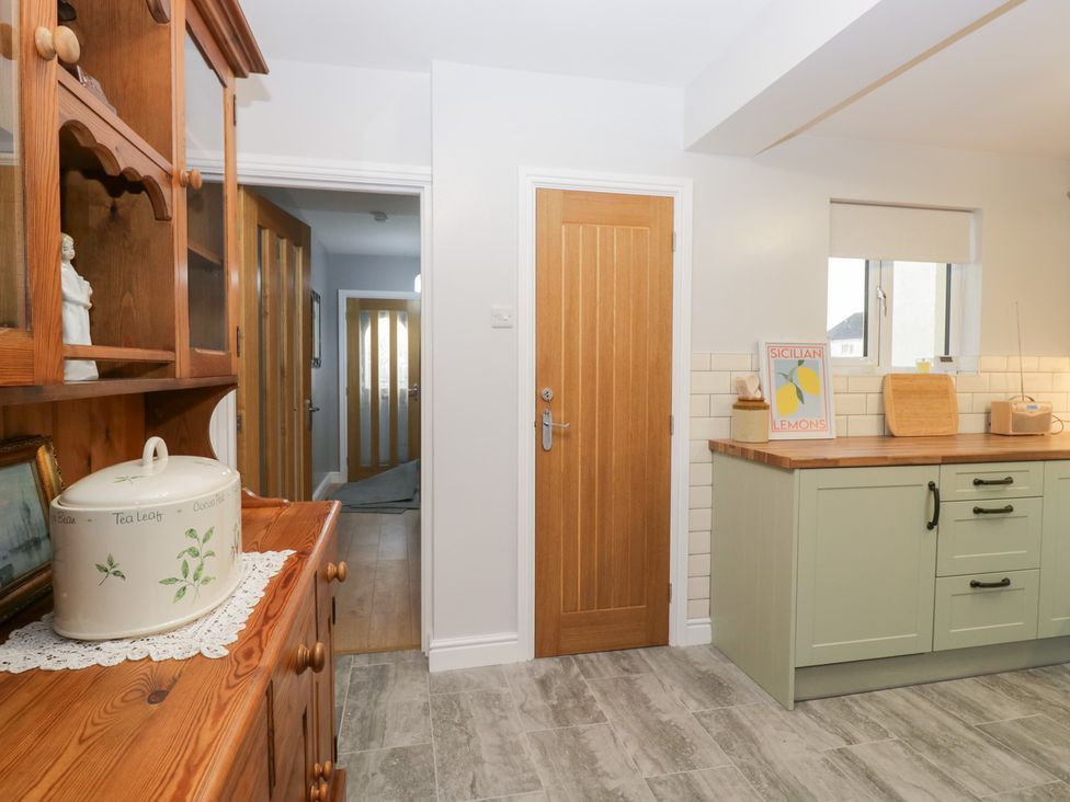 A kitchen with a cupboard and countertop at Mables in Wigton
