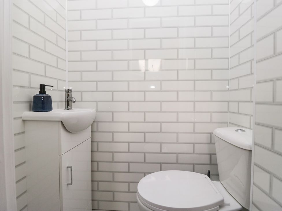 A bathroom with a sink and toilet at Mables in Wigton