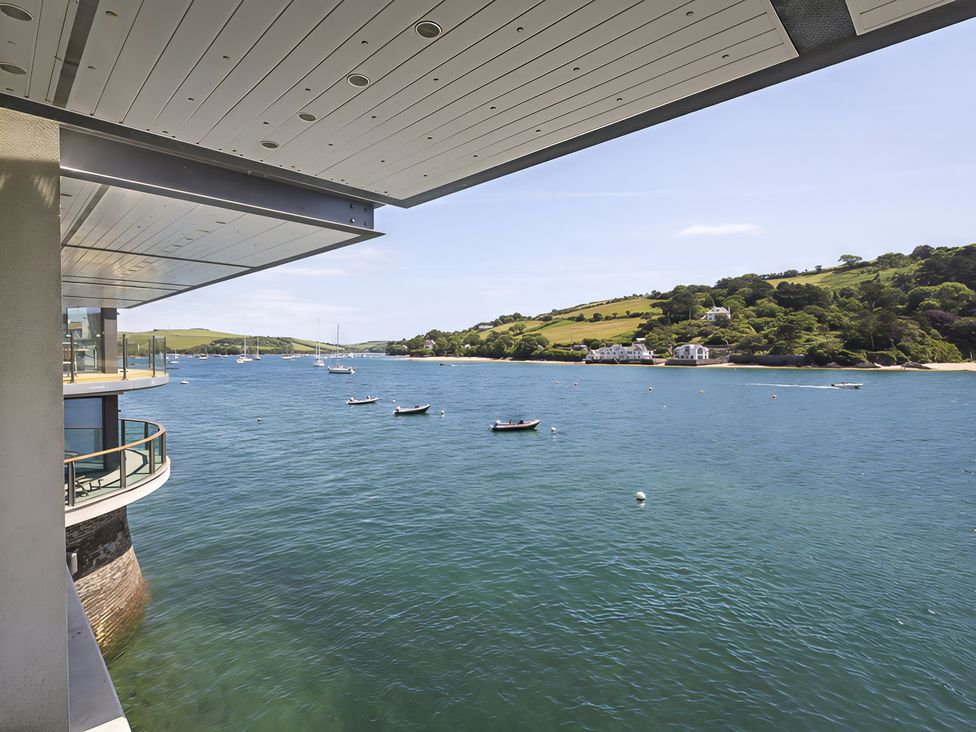 A view of water and boats from a property at Villa 8, Estura Salcombe