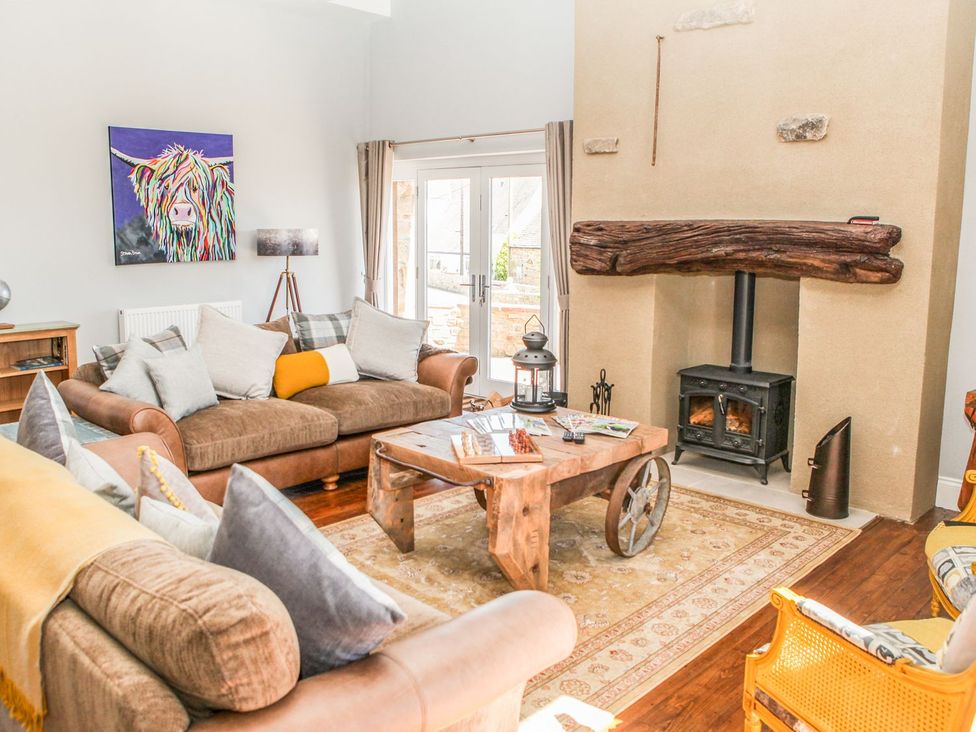 A living room with a sofa and a coffee table at The Granary in Durham
