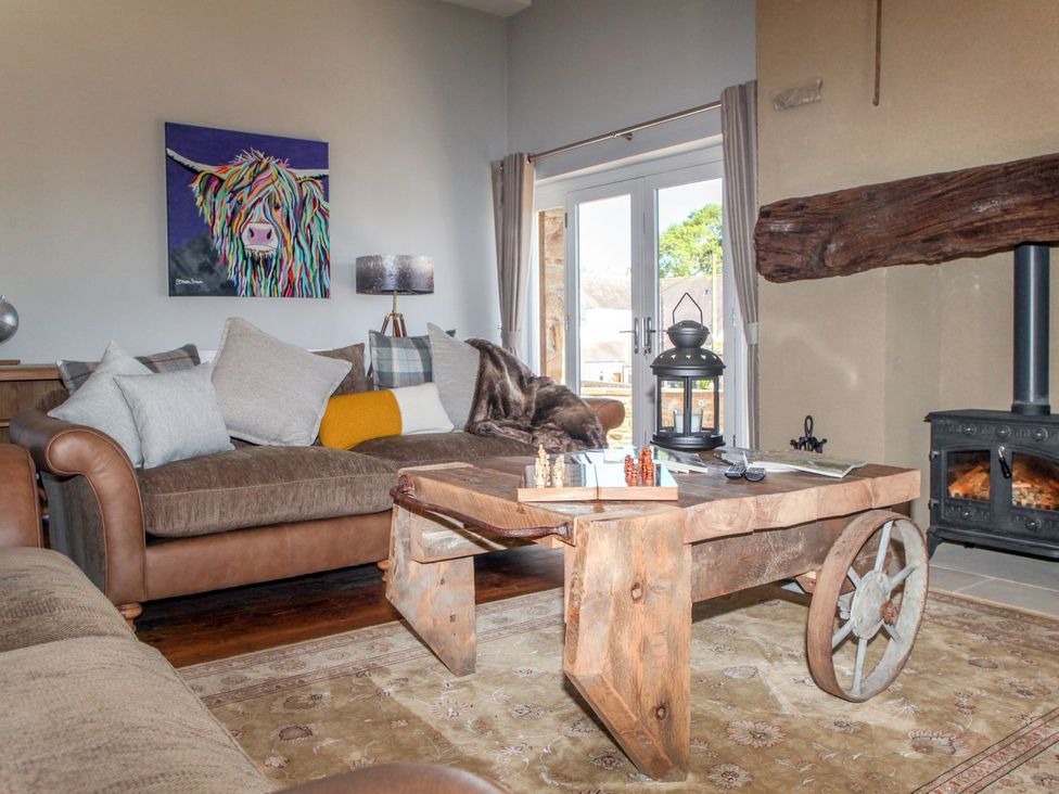 A living room with a sofa and a coffee table at The Granary in Durham