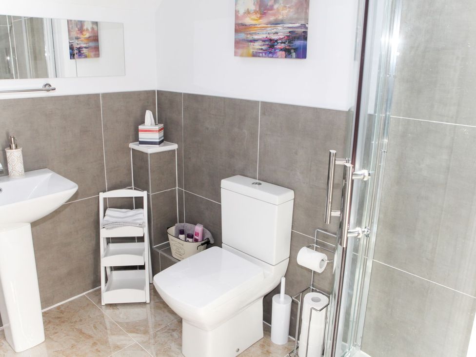 A bathroom with a sink and toilet at The Granary in Durham