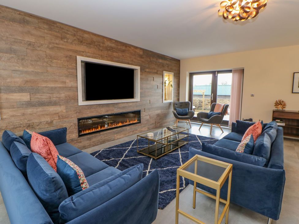 A living room with a sofa and coffee table at Stackyard in Durham