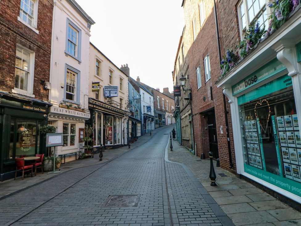 A street with shops and a cafe at Stackyard, Durham
