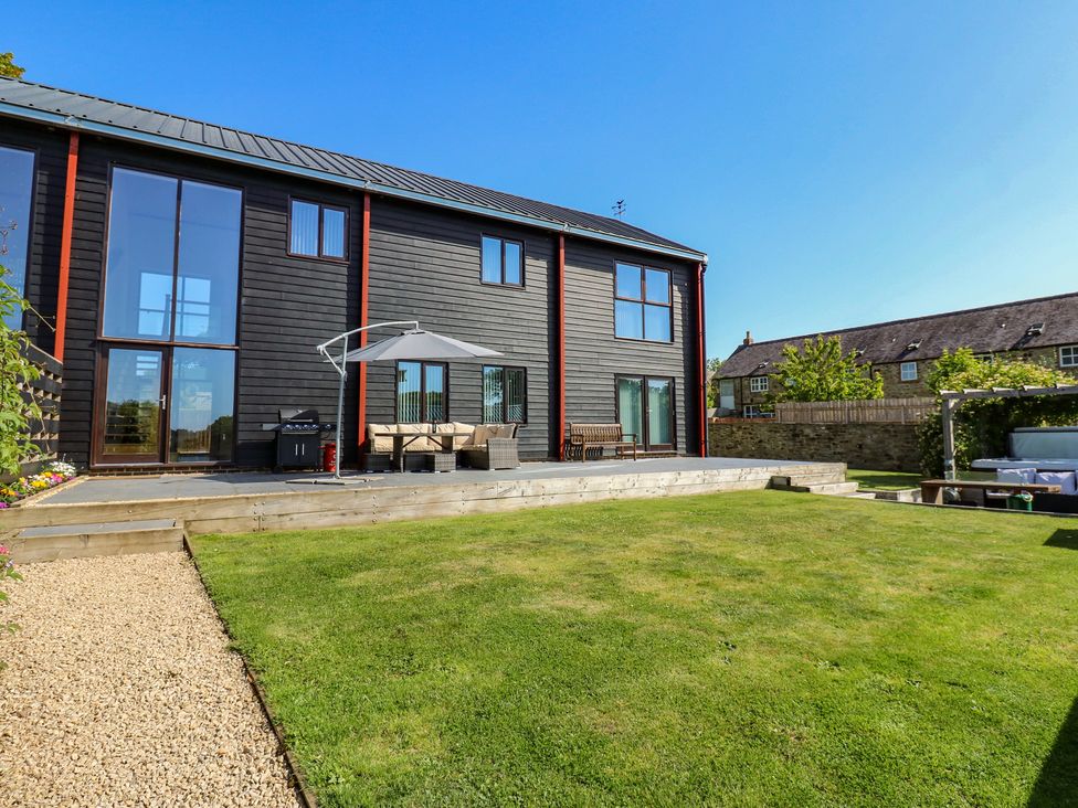 A house with garden and deck at Stackyard Witton Gilbert