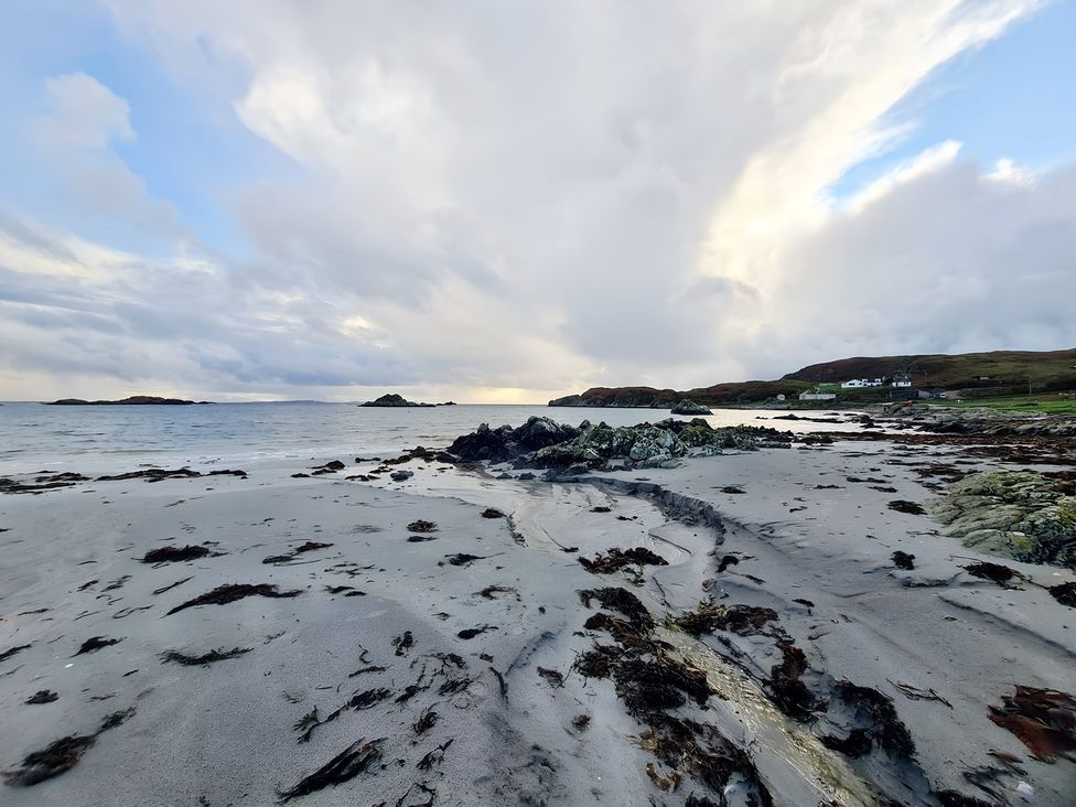 A beach with sand and rocks at Erisgeir, Isle of Mull