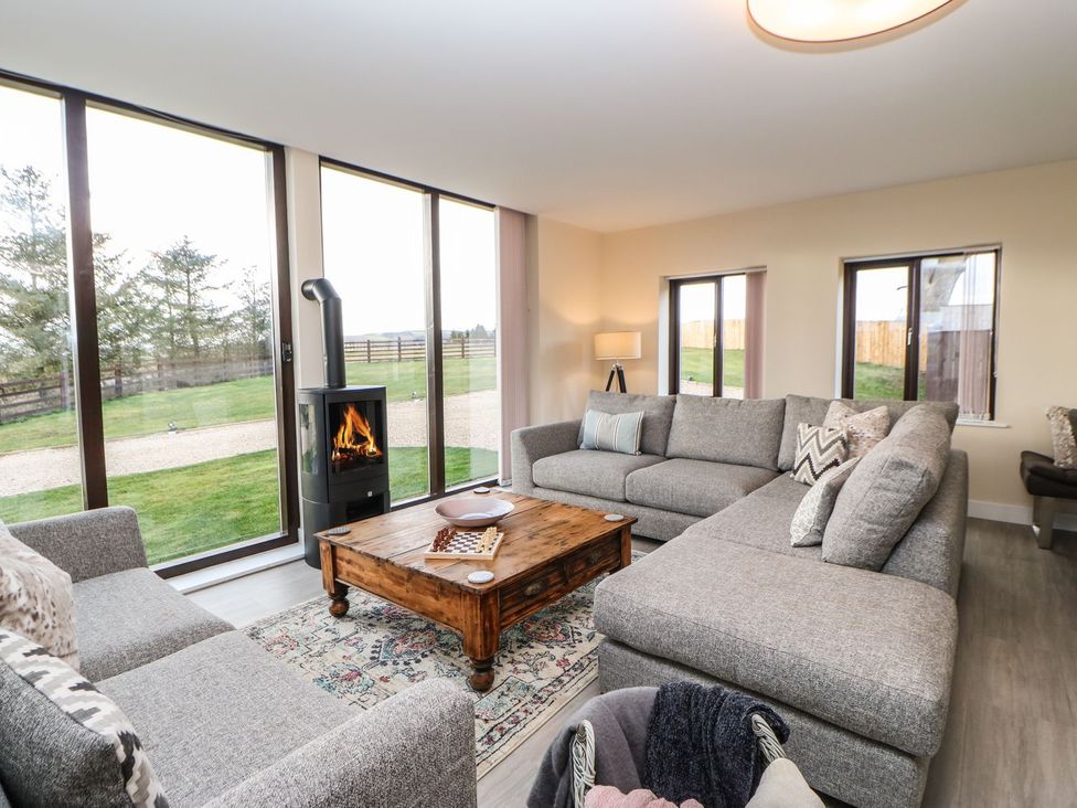 A living room with a sofa and coffee table at High Church Hill in Durham