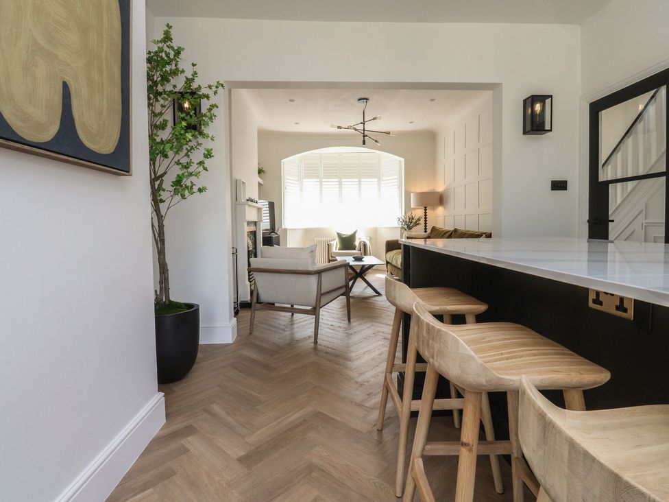 A living room with a table and chairs at 11 Sandhurst Avenue Lytham St. Annes