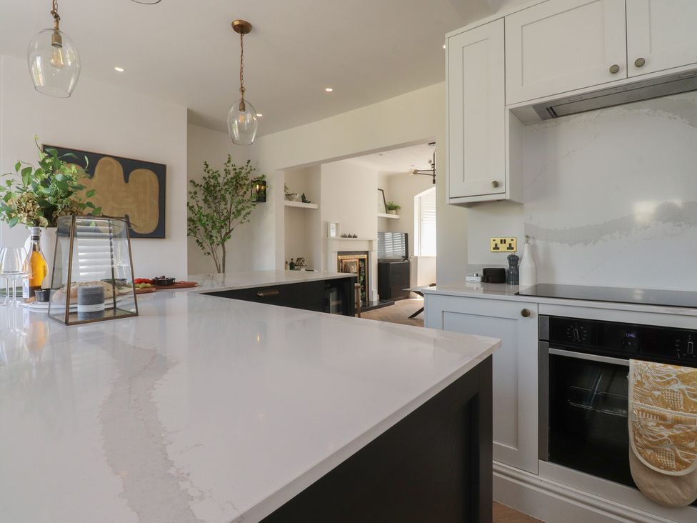 A kitchen with a countertop and appliances at 11 Sandhurst Avenue Lytham St. Annes