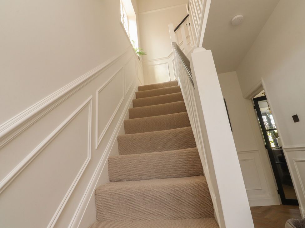 A staircase leading to the upper floor at 11 Sandhurst Avenue Lytham St. Annes