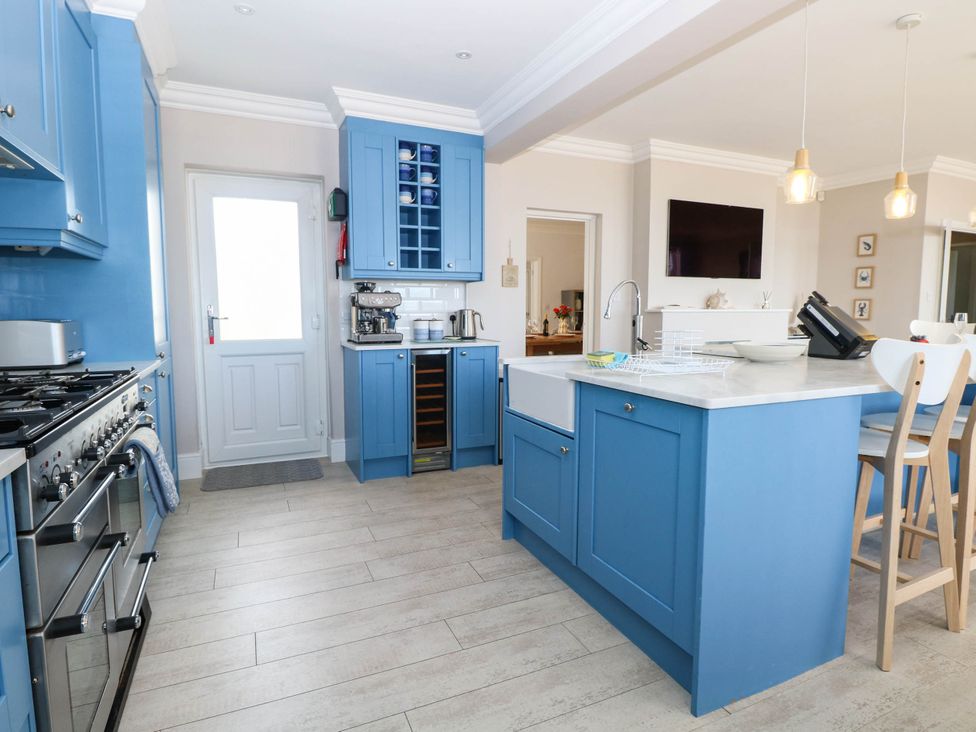 A kitchen with cabinets and a sink at Cootiya Corner in Great Lyth