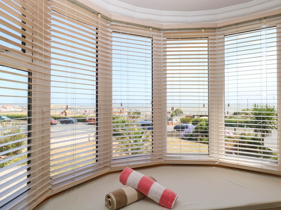 A living room with a window and blinds at Cootiya Corner in Great Lyth