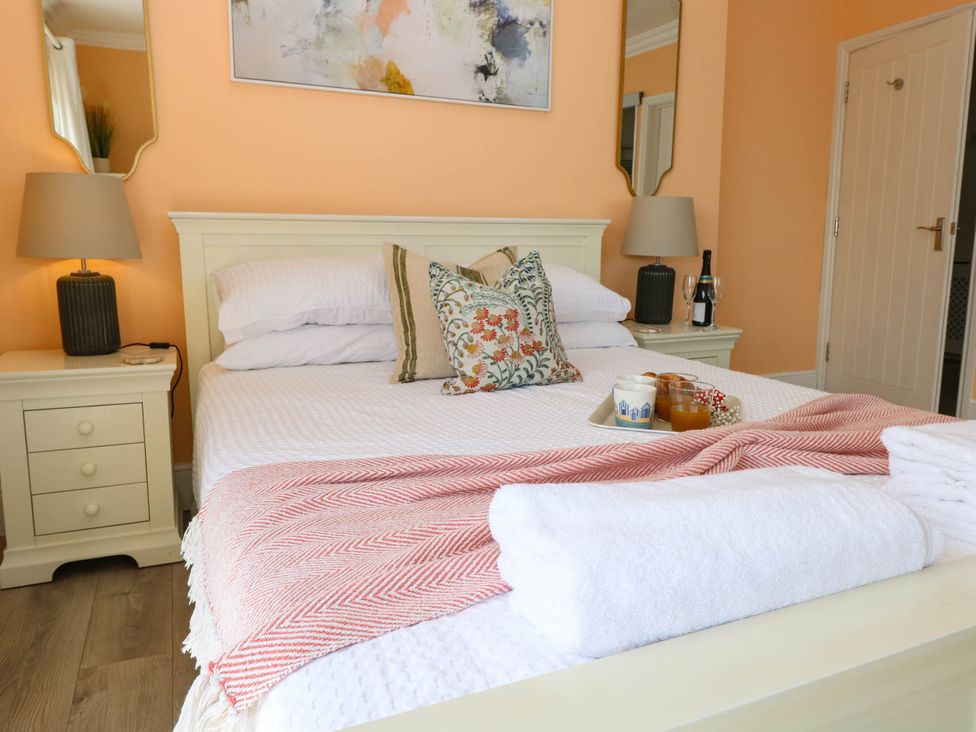 A bedroom with a bed and bedside table at Cootiya Corner in Great Lyth