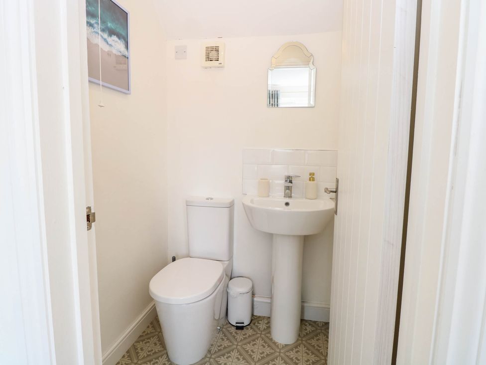 A bathroom with a toilet and sink at Cootiya Corner in Great Lyth