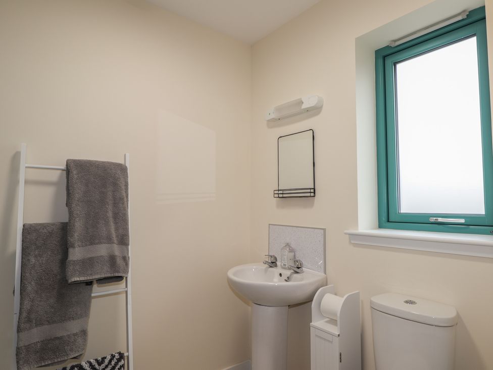 A bathroom with a sink and toilet at Sonas in Strathcarron