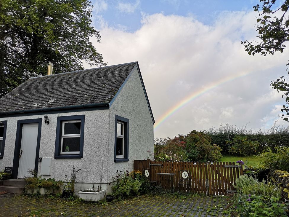 A house with a garden and fence at Claymires Stirling