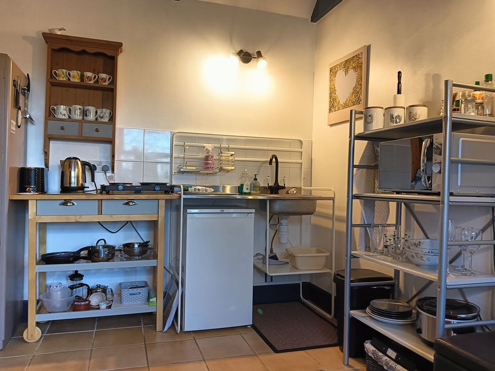 A kitchen with various kitchen appliances and utensils at Claymires Stirling