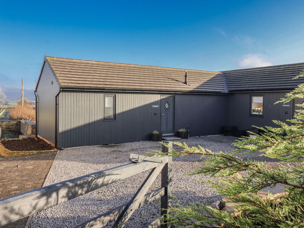 A house with gravel path and plants at Genesis in Richmond