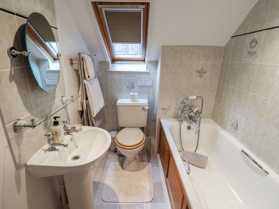 A bathroom with a sink and toilet at Ellishayes Farm in Combe Raleigh