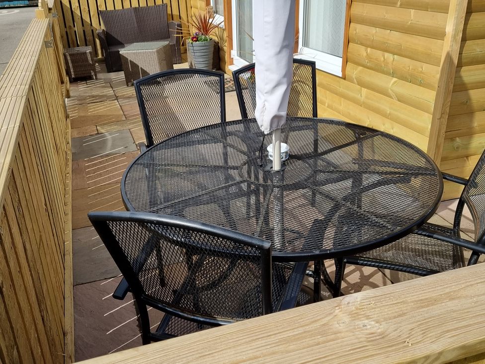 An outdoor area with a table and chairs at 226 Third Avenue in Bridlington