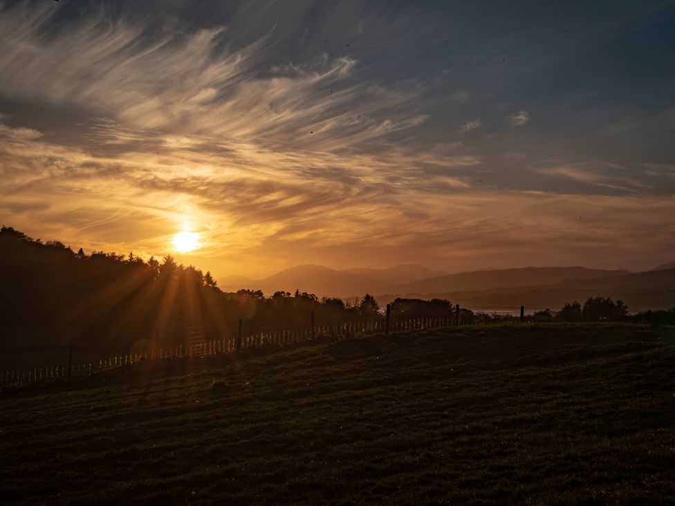 A sunset view over a landscape at Nethermill Lodges Port Glasgow