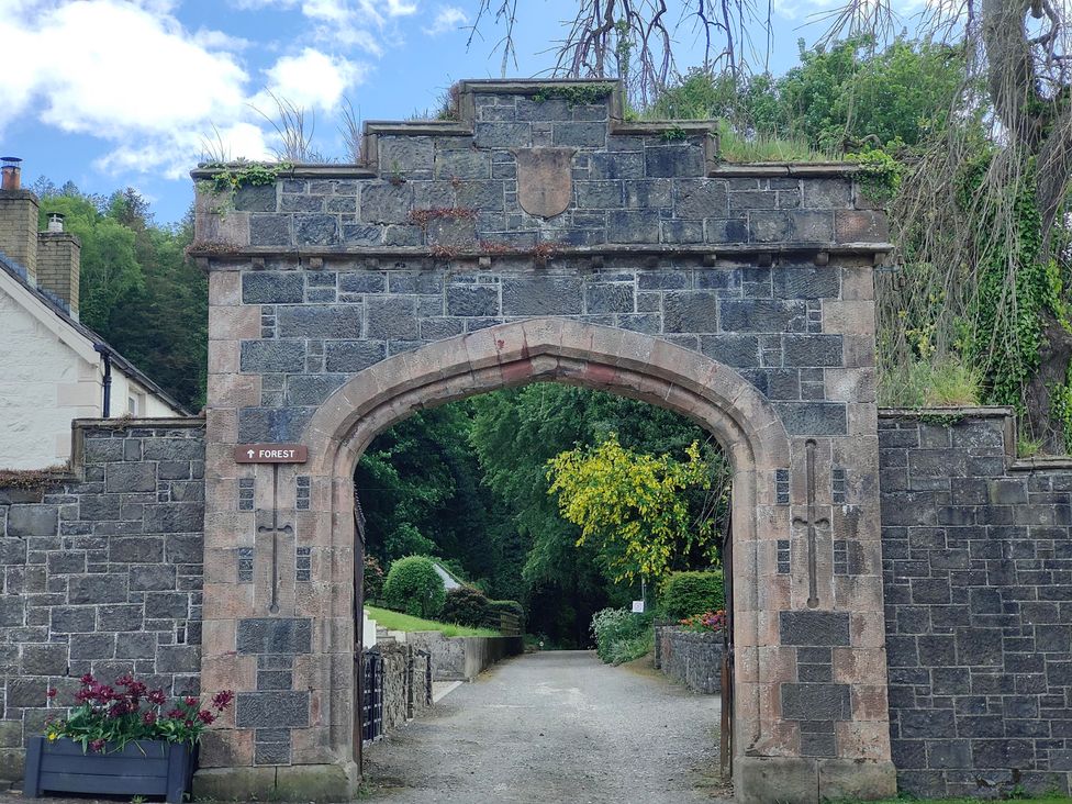An archway leading to a path with a garden area at 17 Castleview Ballymena