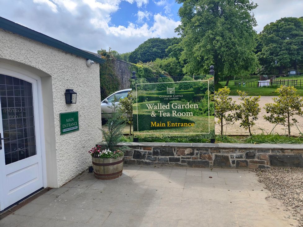 A main entrance sign for the Walled Garden and Tea Room at Glenarm Castle and Garden in Ballymena
