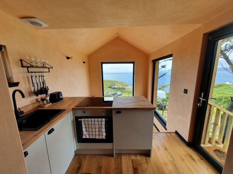 A kitchen with a sink and cooking range at Cullinview in Isle of Skye