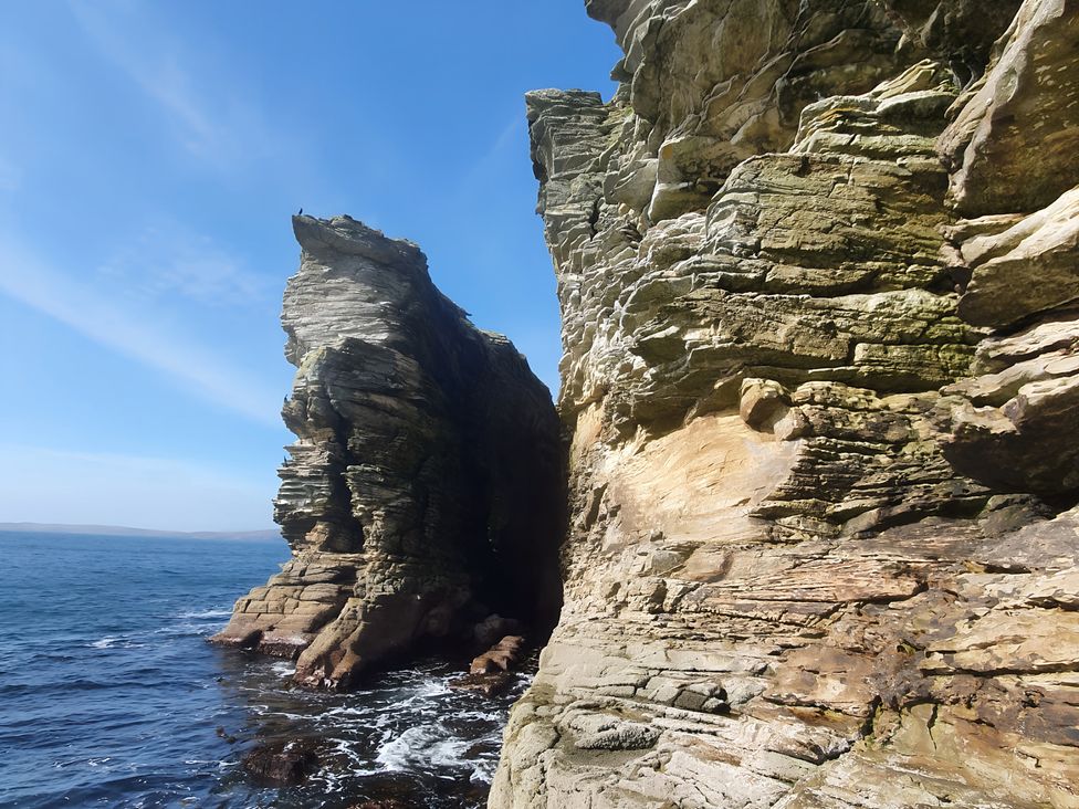 Rock formations along the shoreline by the sea at Cullinview Isle of Skye