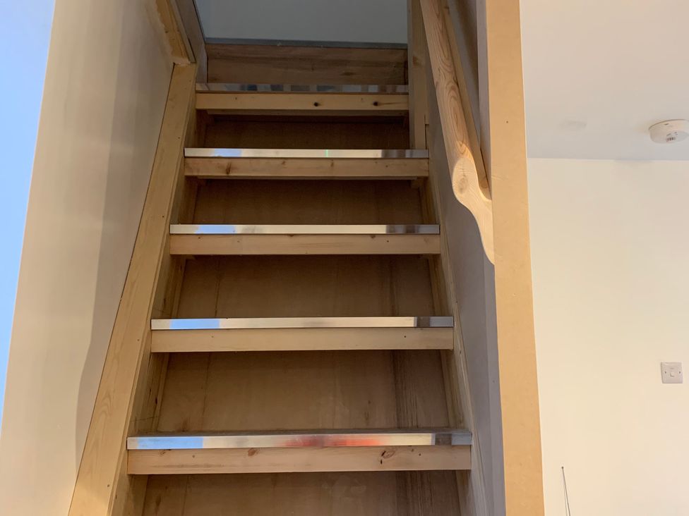 Stairs with a handrail at The Haven in Penrith