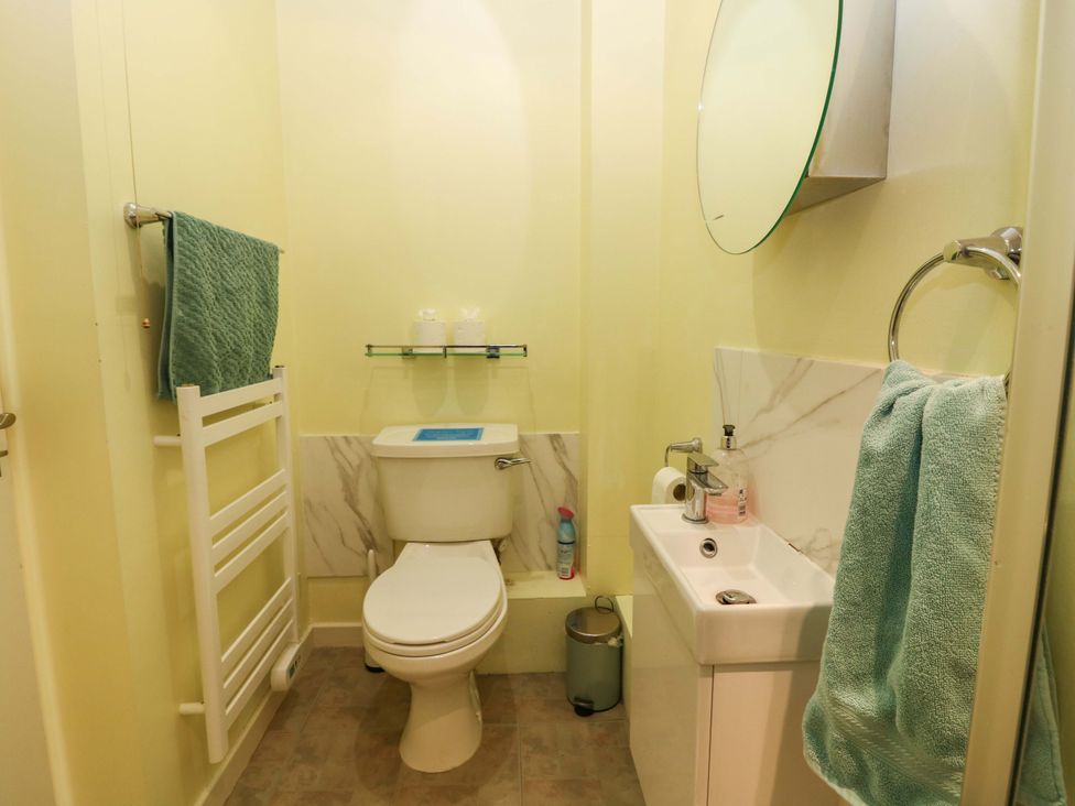 A bathroom with a toilet and sink at Keepers Fold at The Lighhouse St Abbs