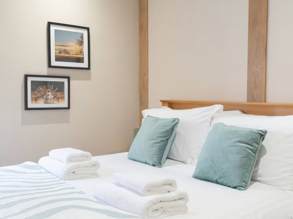 A bedroom with a bed and pillows at Apt.1 