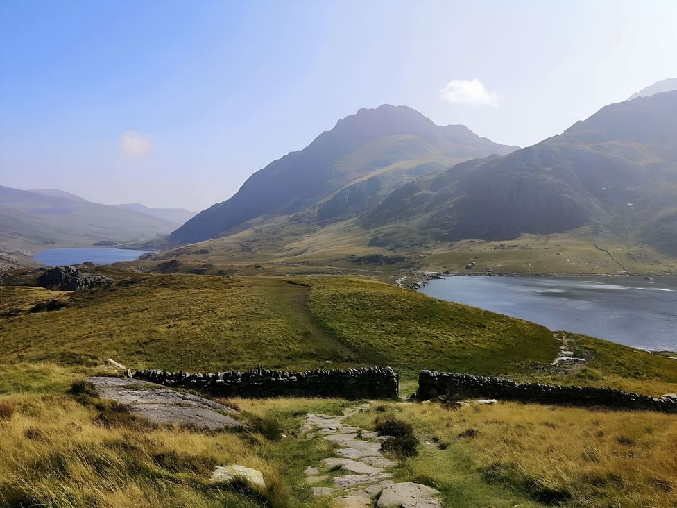 A landscape view with mountains and a lake at Sea view cottage in Penmaenmawr