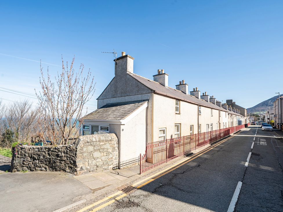 A row of houses on a street at Sea view cottage Penmaenmawr