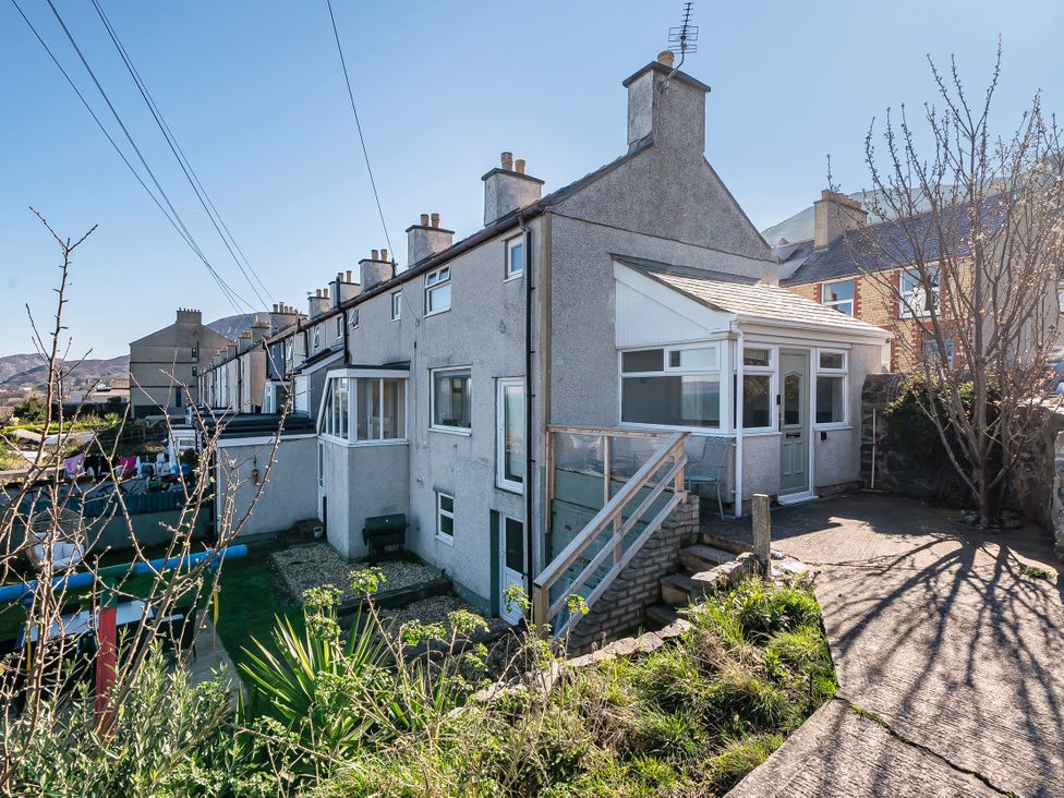 A house with a veranda and garden at Sea view cottage in Penmaenmawr