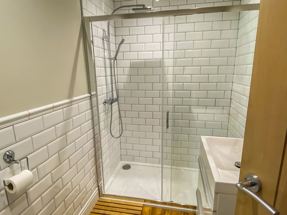 A bathroom with a shower and sink at Fox Lodge in York