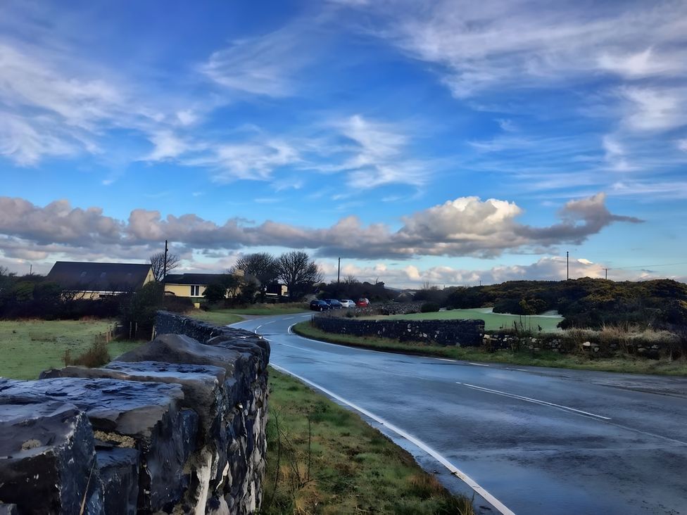 A view of the road with houses and clouds at Country Retreat Sleeps 2 in Holyhead