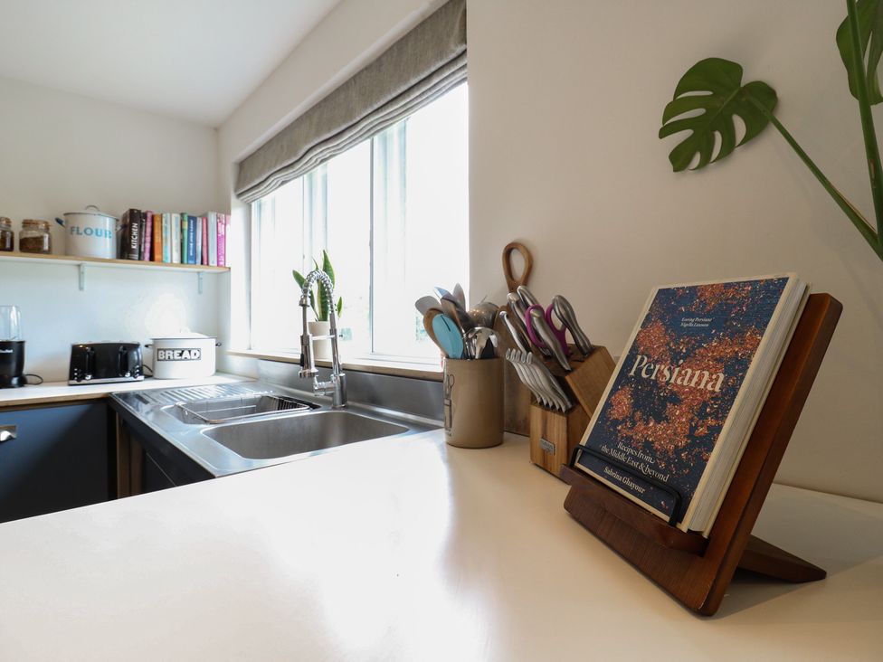 A kitchen with a sink and countertop at Denmark House, Chatham, Kent