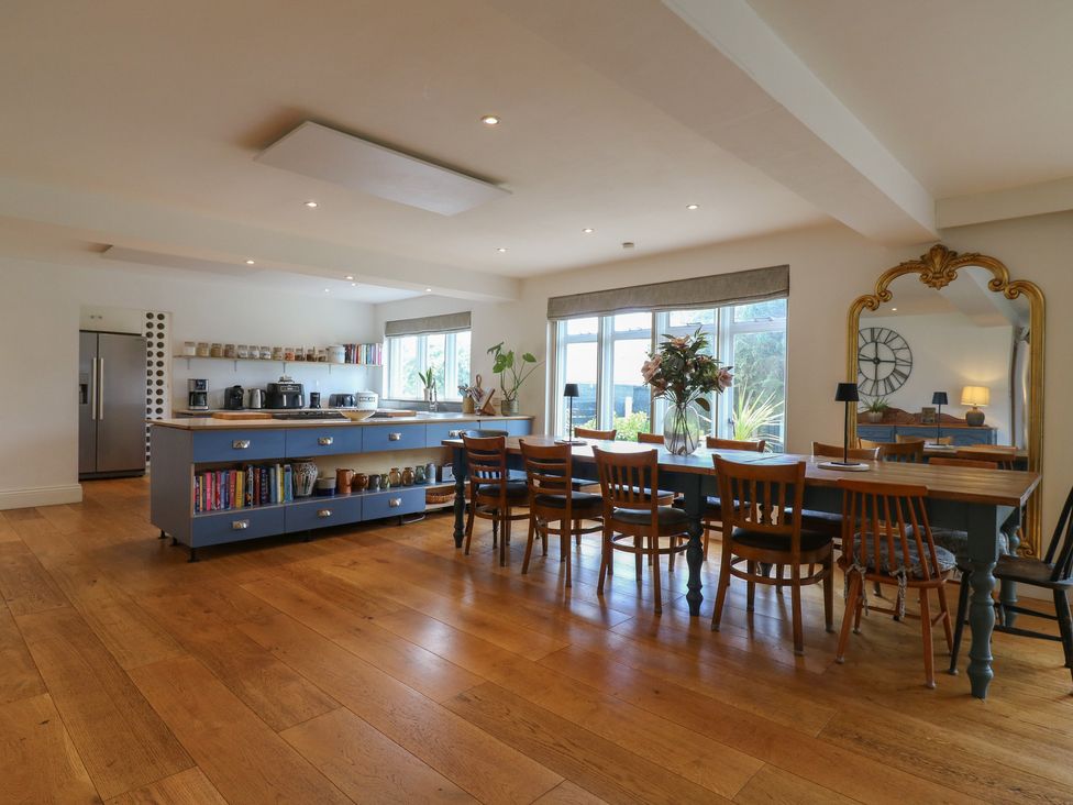A kitchen with a table and chairs at Denmark House in Chatham, Kent