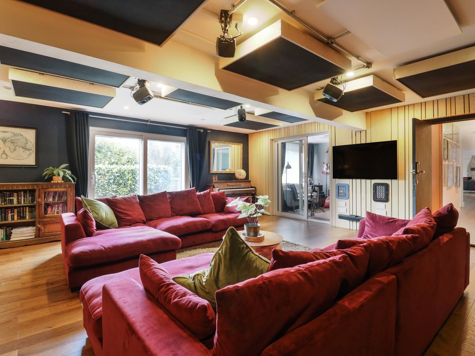 A living room with a sofa and a coffee table at Denmark House in Chatham, Kent