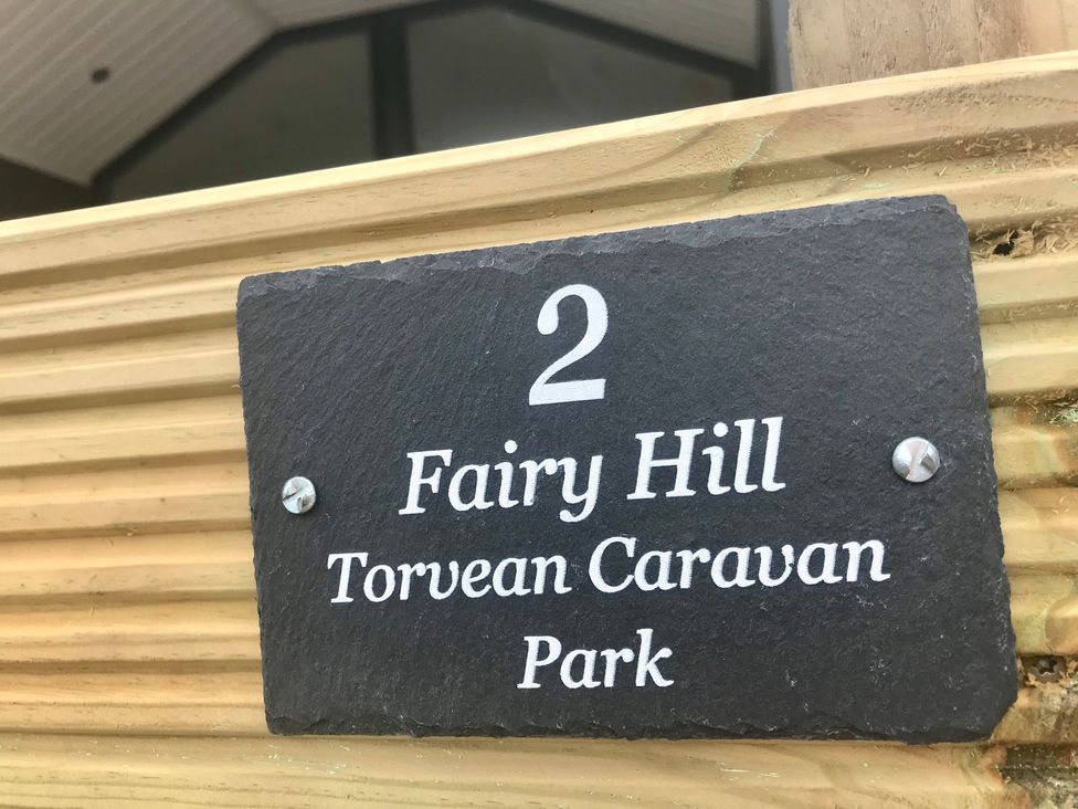 A sign displaying number 2 and Fairy Hill at Torvean Caravan Park in Inverness