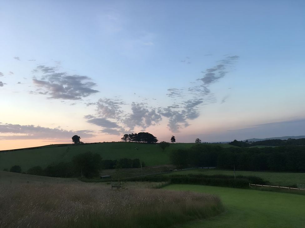 A scenic view of hills and trees at Shepherds hut Dumfries