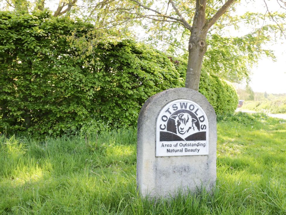 A sign indicating the Cotswolds Area of Outstanding Natural Beauty
