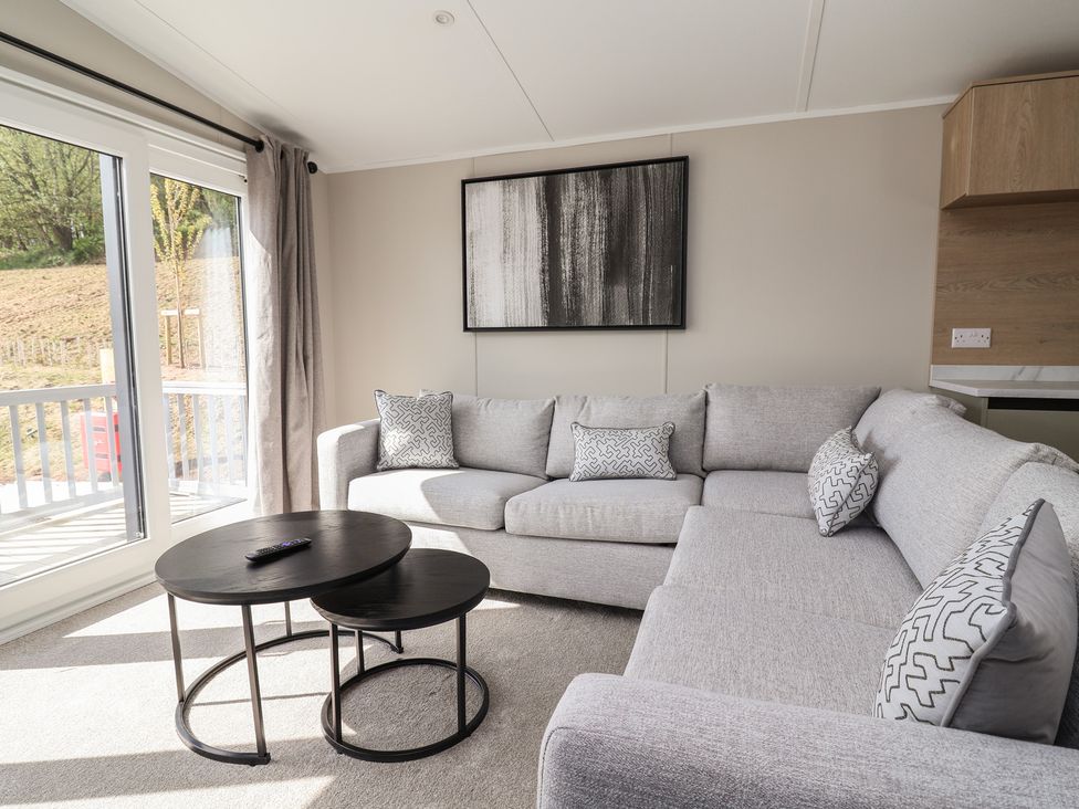 A living room with a sofa and coffee table at No.6 - The Pines in Delamere